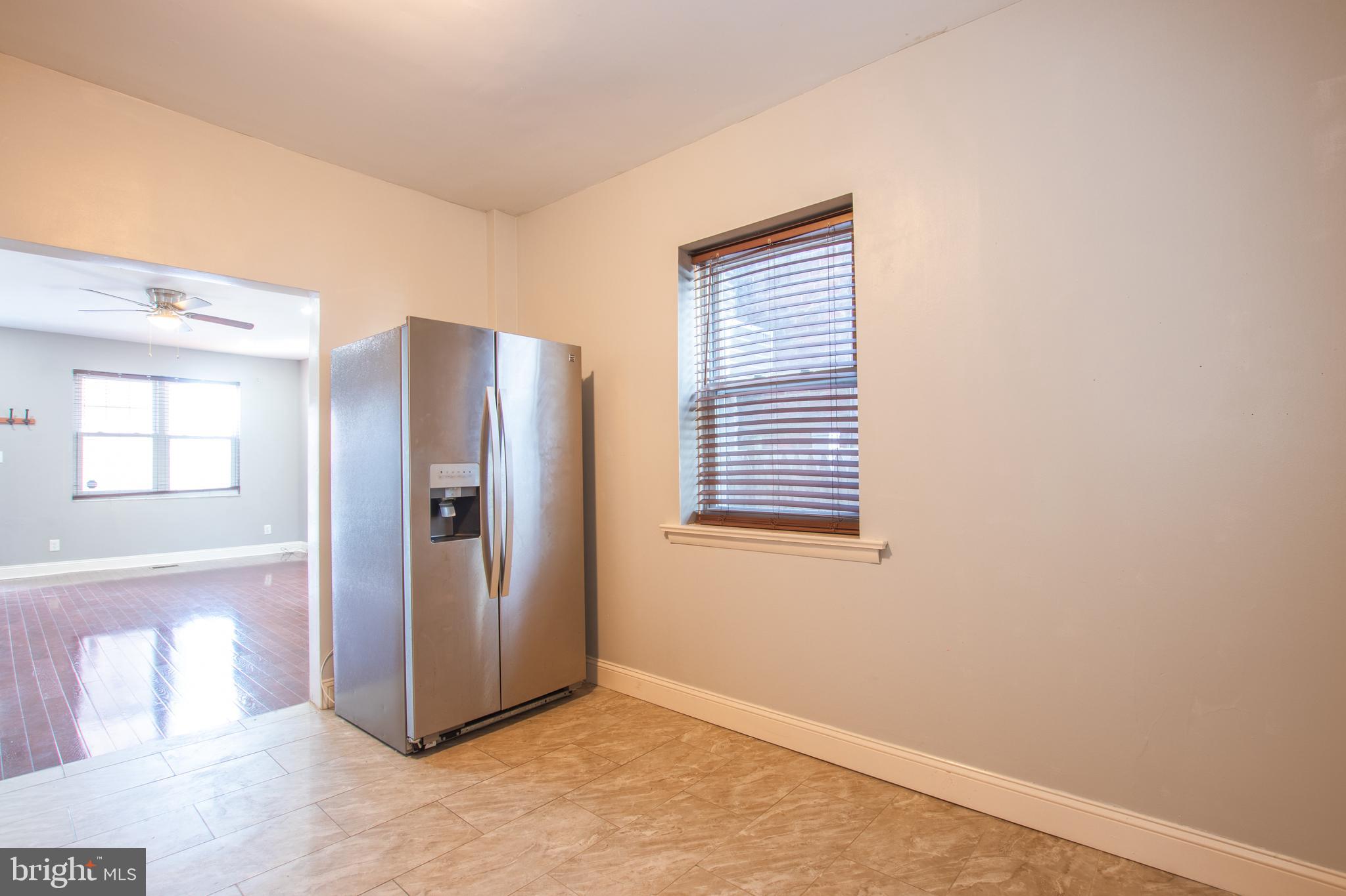 2707 Morris Street Philadelphia, PA 19145 - Photo 9 of 26 a view of an empty room with window and refrigerator