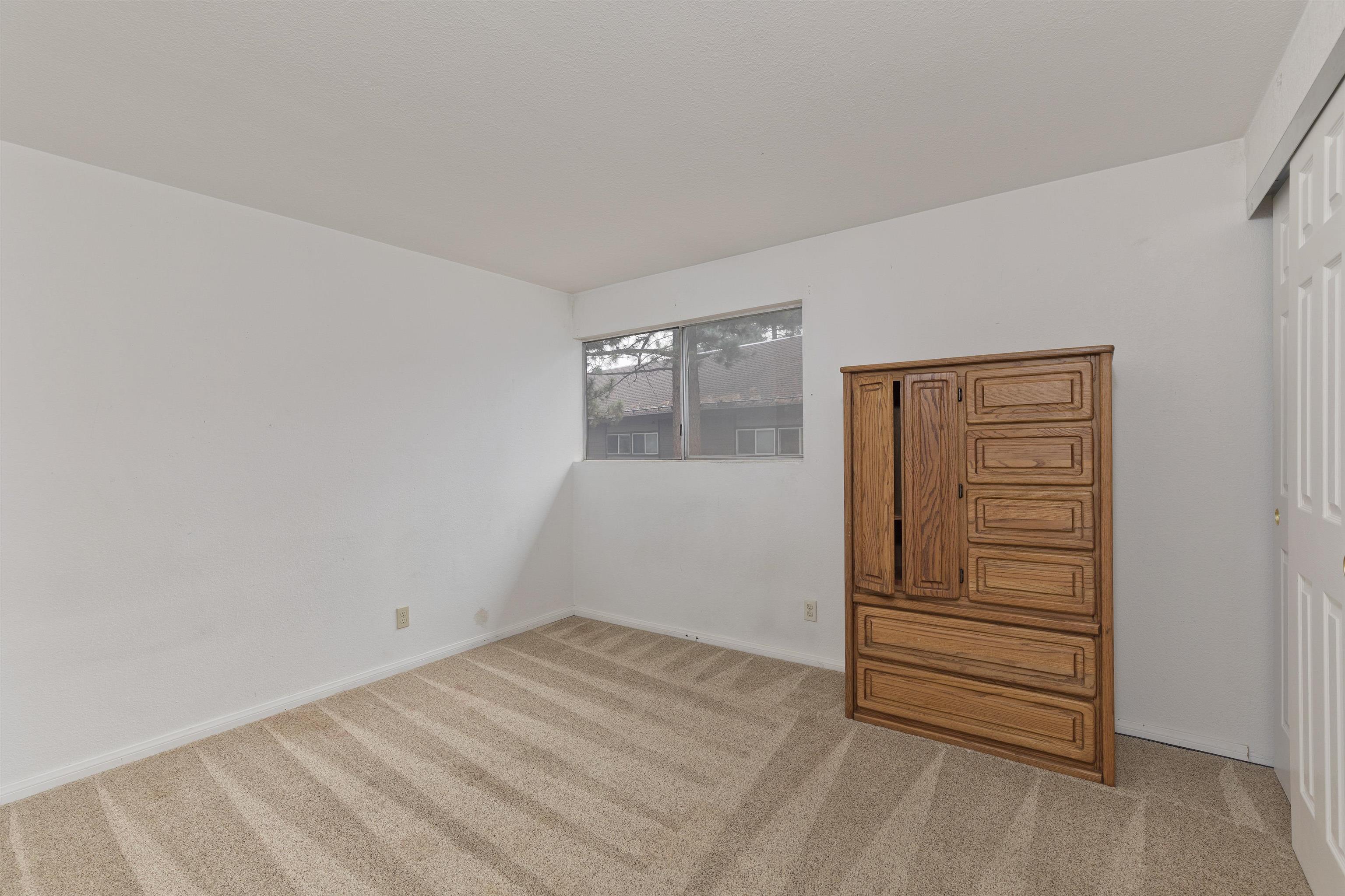 165 Old Mammoth Road, Unit 132 Mammoth Lakes, CA 93546 - Photo 16 of 26 a view of an empty room and fire place
