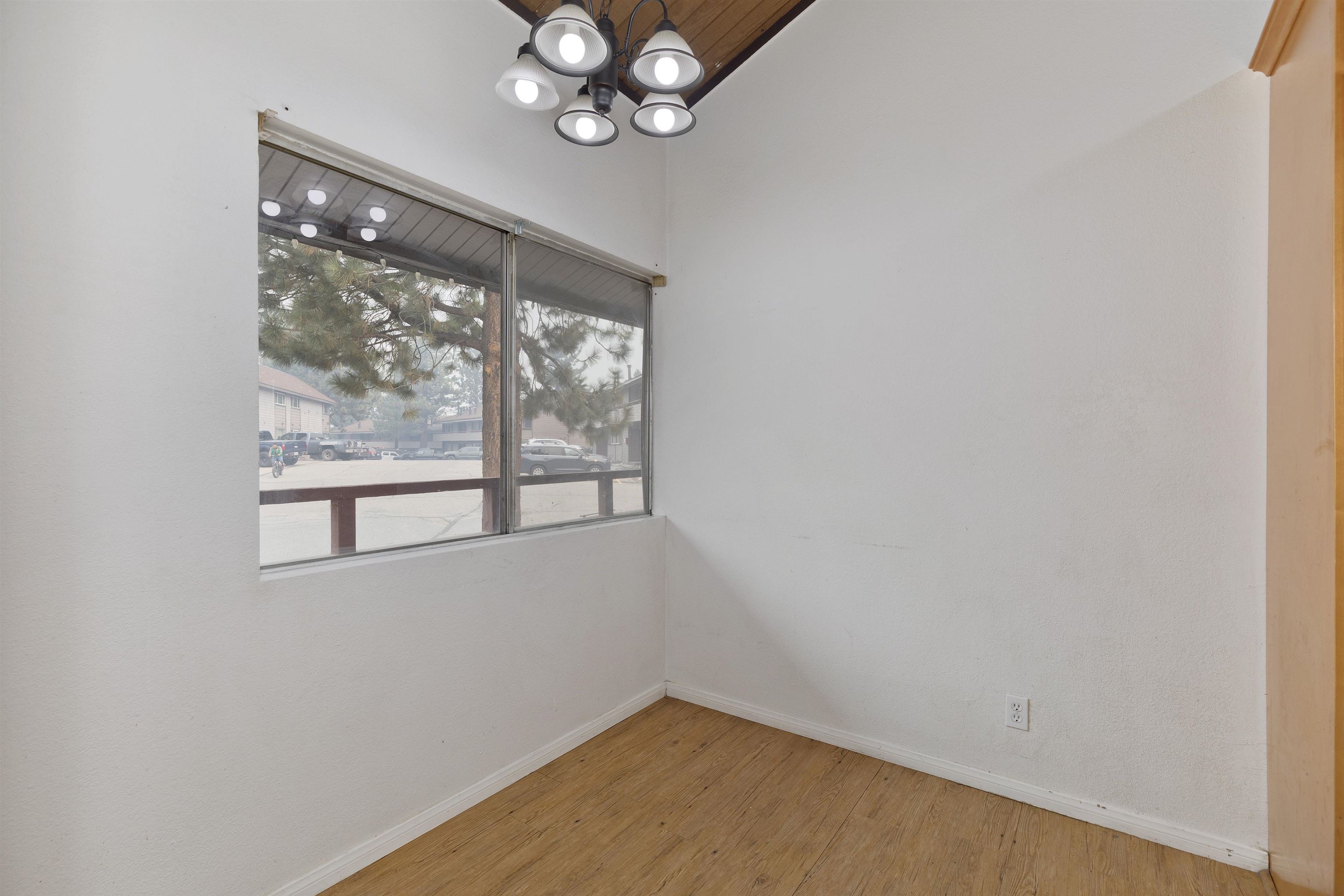 165 Old Mammoth Road, Unit 132 Mammoth Lakes, CA 93546 - Photo 9 of 26 an empty room with a window