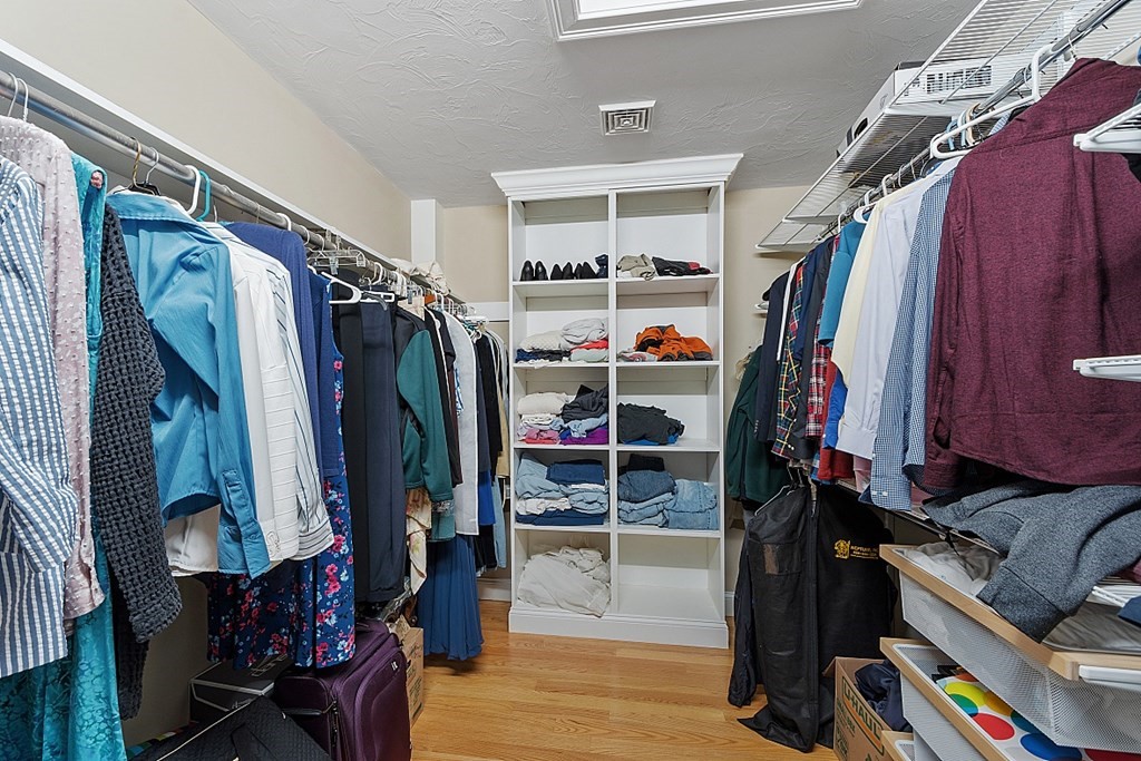 24 Little Turnpike Road Shirley, MA 01464 - Photo 11 of 42 a view of walk in closet with clothes and shoes