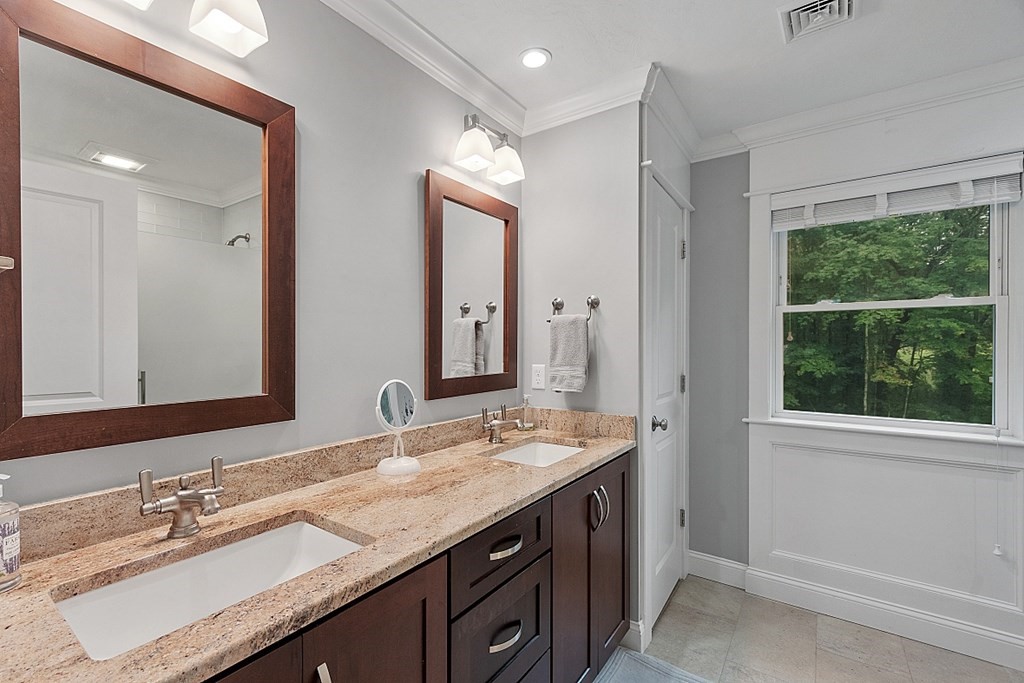 24 Little Turnpike Road Shirley, MA 01464 - Photo 12 of 42 a bathroom with a sink double vanity and a mirror