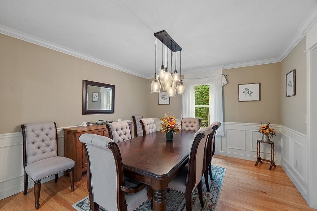 24 Little Turnpike Road Shirley, MA 01464 - Photo 27 of 42 a view of a dining room with furniture window and wooden floor