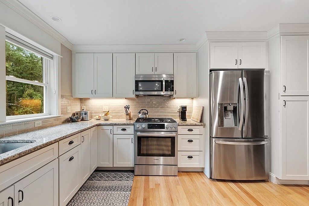 24 Little Turnpike Road Shirley, MA 01464 - Photo 29 of 42 a kitchen with stainless steel appliances a refrigerator stove and sink
