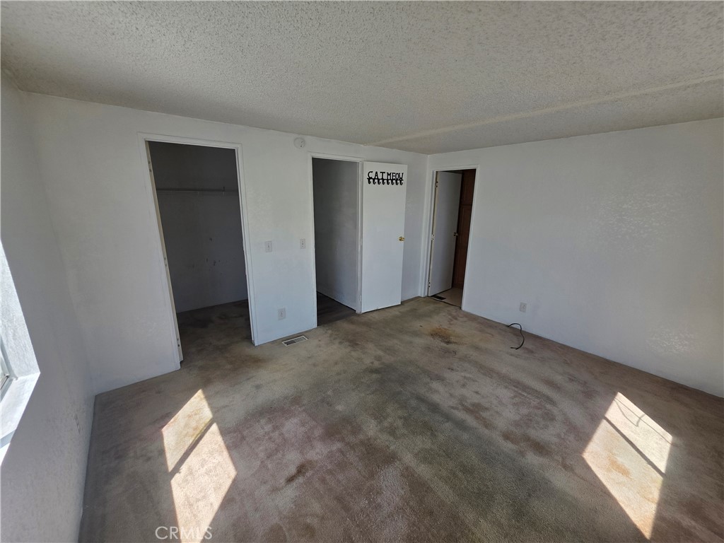 1010 Terrace Road, Unit 142 San Bernardino, CA 92410 - Photo 13 of 21 primary suite with walk in closet