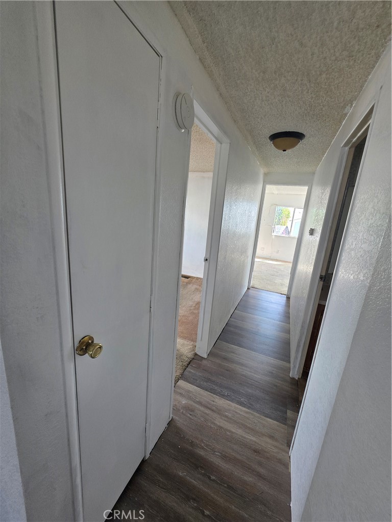 1010 Terrace Road, Unit 142 San Bernardino, CA 92410 - Photo 10 of 21 new flooring in hallway