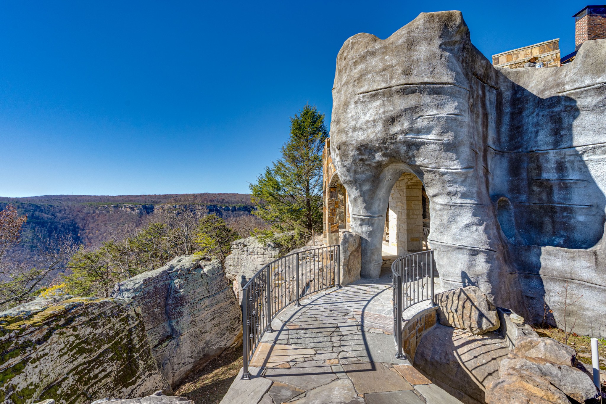 8608 Brow Lake Road Soddy Daisy, TN 37379 - Photo 11 of 23 a view of a balcony with couches and wooden floor