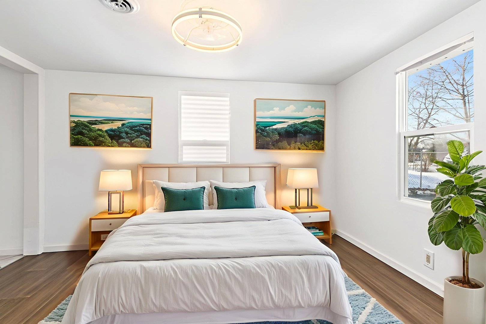 612 South Webster Street Aurora, IL 60505 - Photo 18 of 24 a bedroom with a bed and a painting on the wall