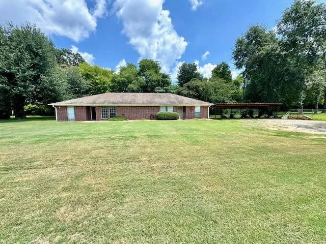 a house view with a swimming pool