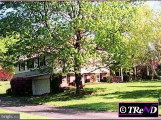 1117 Millbrook Road Berwyn, PA 19312 - Photo 1 of 1 front view of a house with a yard