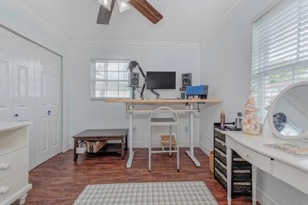 a workspace with furniture and window