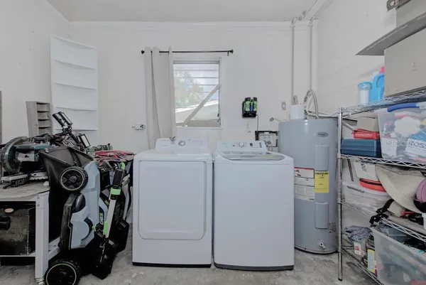 a storage room with washer and dryer