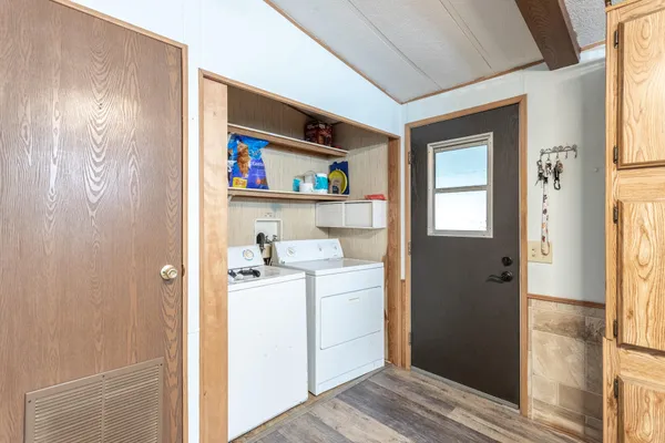 a workspace with wooden floor washer and dryer