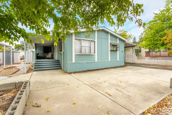 a house with trees in front of it
