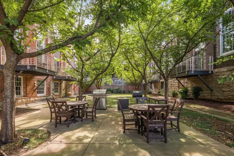 a view of a outdoor space with a table and chairs