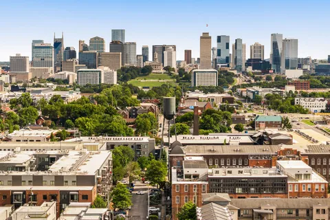 a view of a city with tall buildings