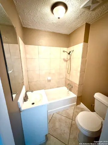 a bathroom with a sink and bathtub