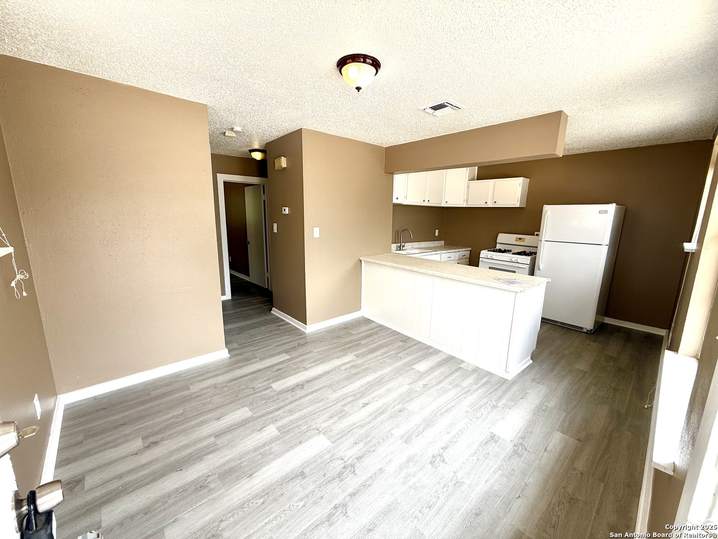 1827 East Highland Boulevard San Antonio, TX 78210 - Photo 3 of 17 a view of a kitchen with a sink