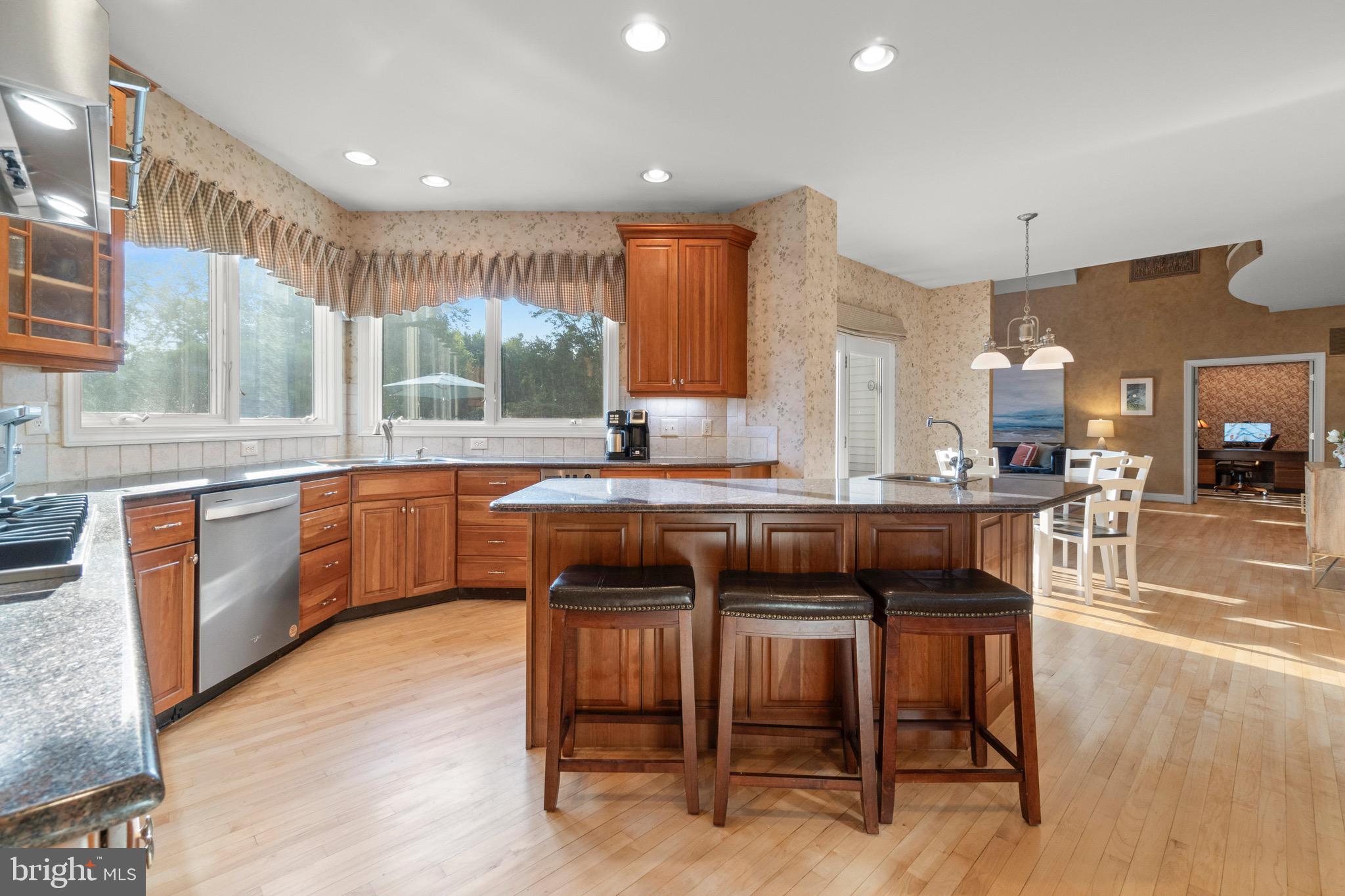 23 Apple Orchard Road Moorestown, NJ 08057 - Photo 15 of 72 a kitchen with a table chairs sink and cabinets