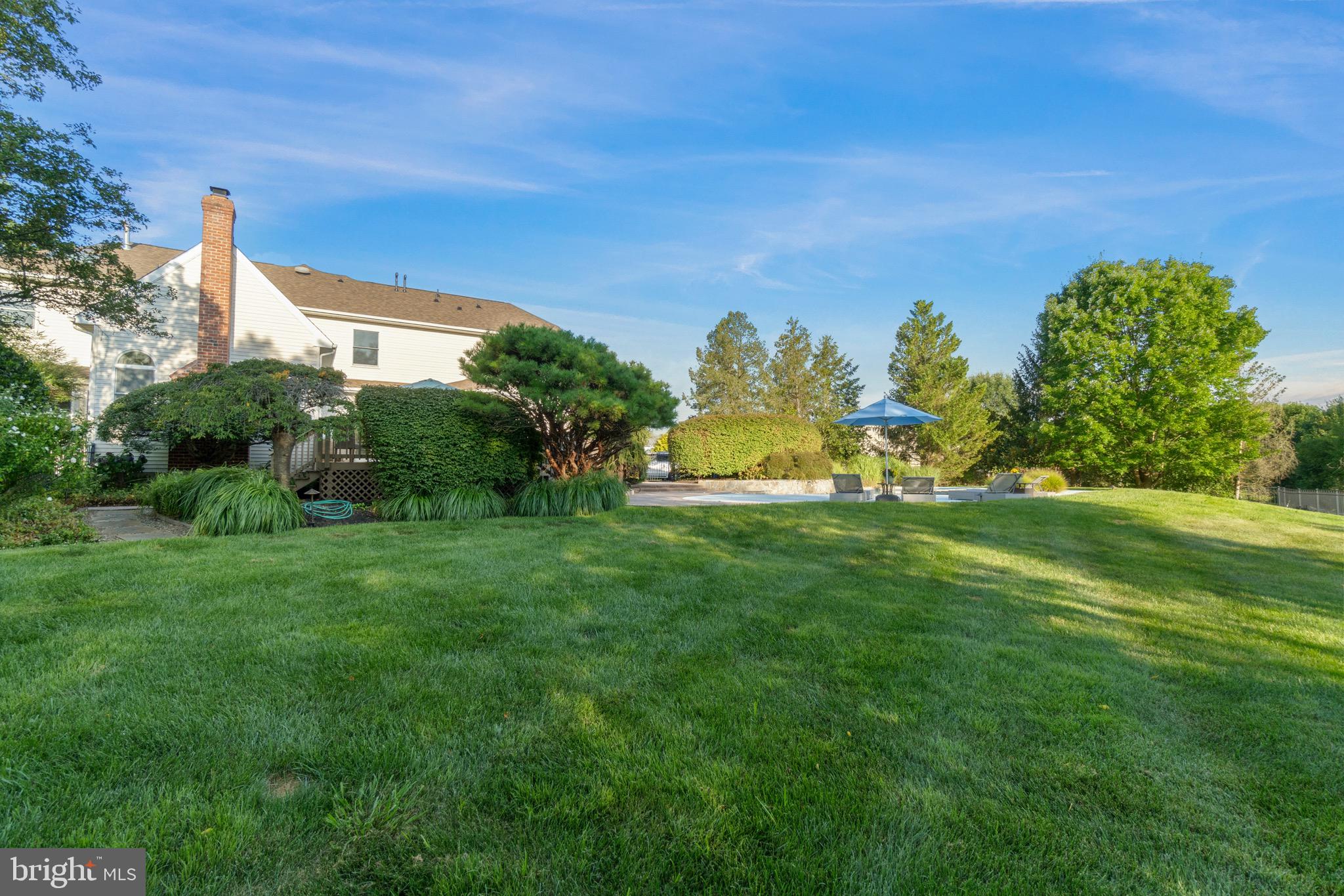 23 Apple Orchard Road Moorestown, NJ 08057 - Photo 63 of 72 a front view of a house with a big yard