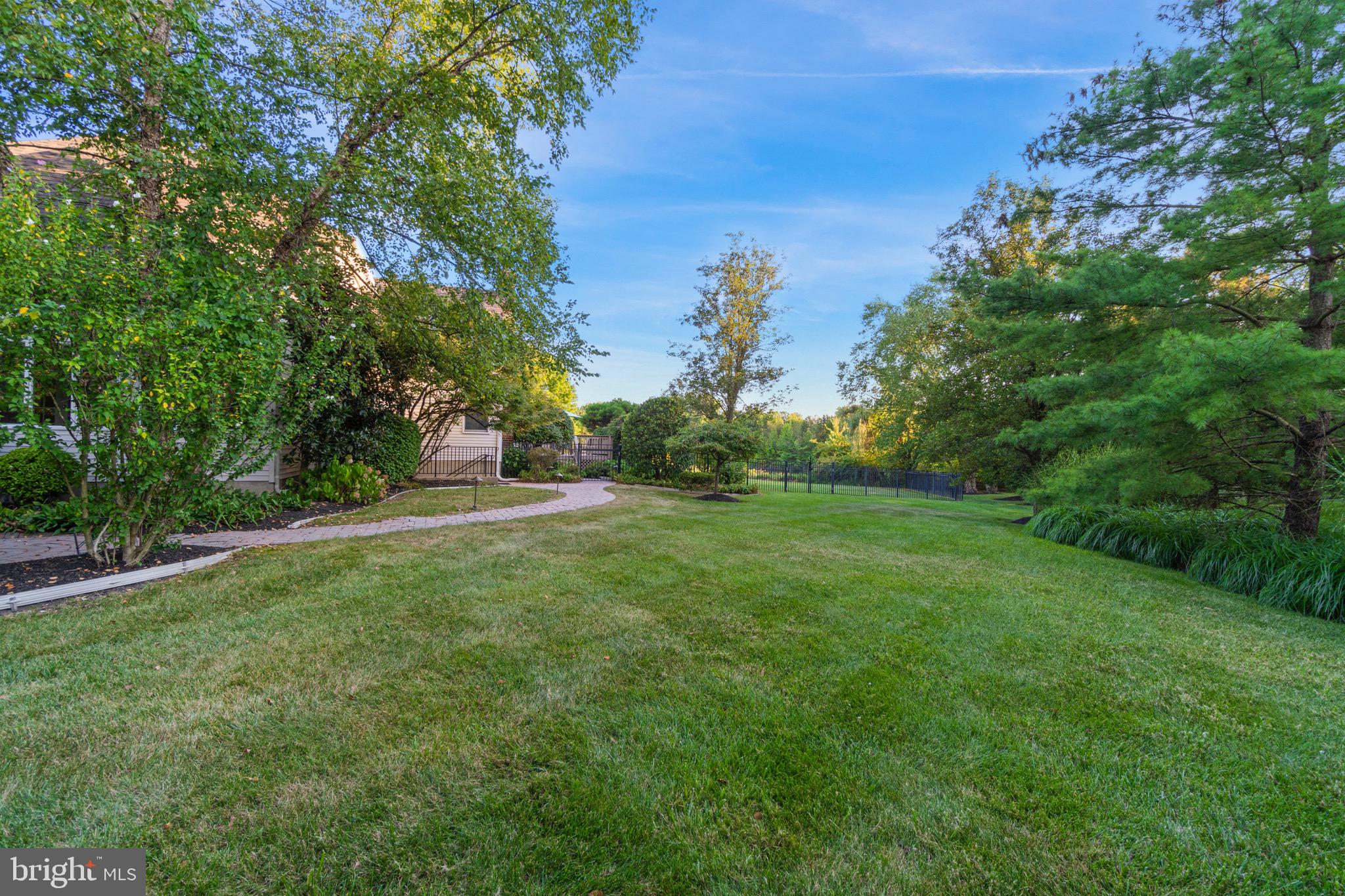 23 Apple Orchard Road Moorestown, NJ 08057 - Photo 65 of 72 a view of a field with trees in the background