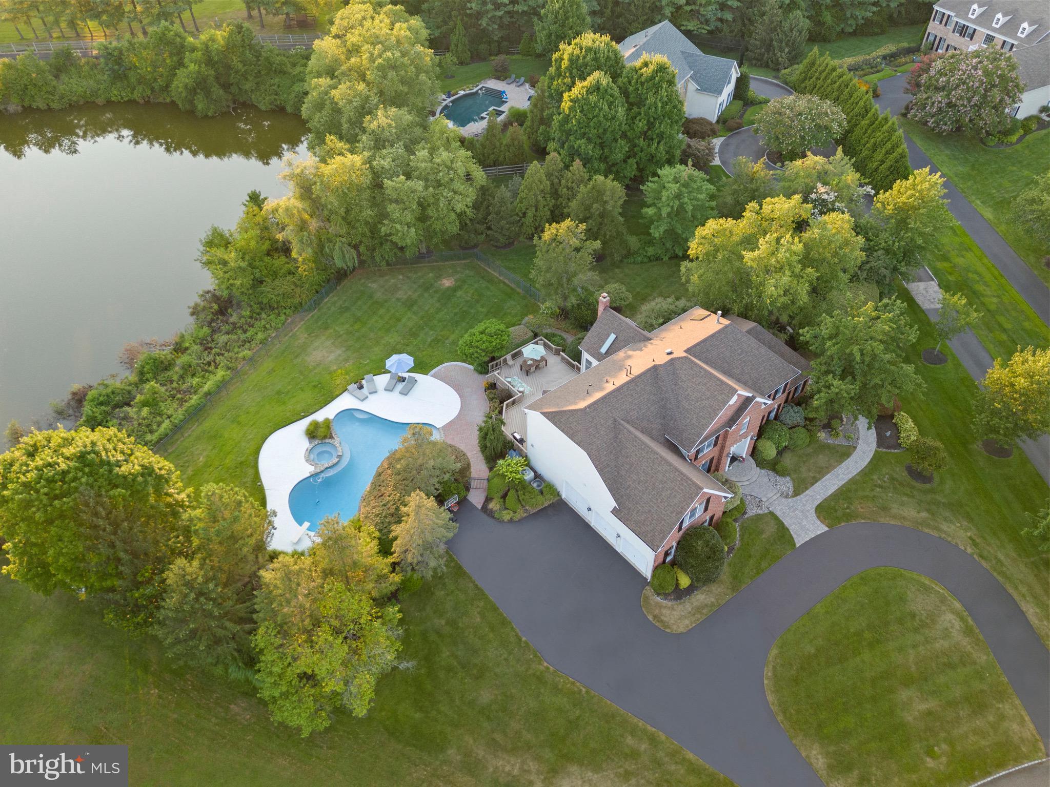 23 Apple Orchard Road Moorestown, NJ 08057 - Photo 72 of 72 an aerial view of a house with a garden and lake view