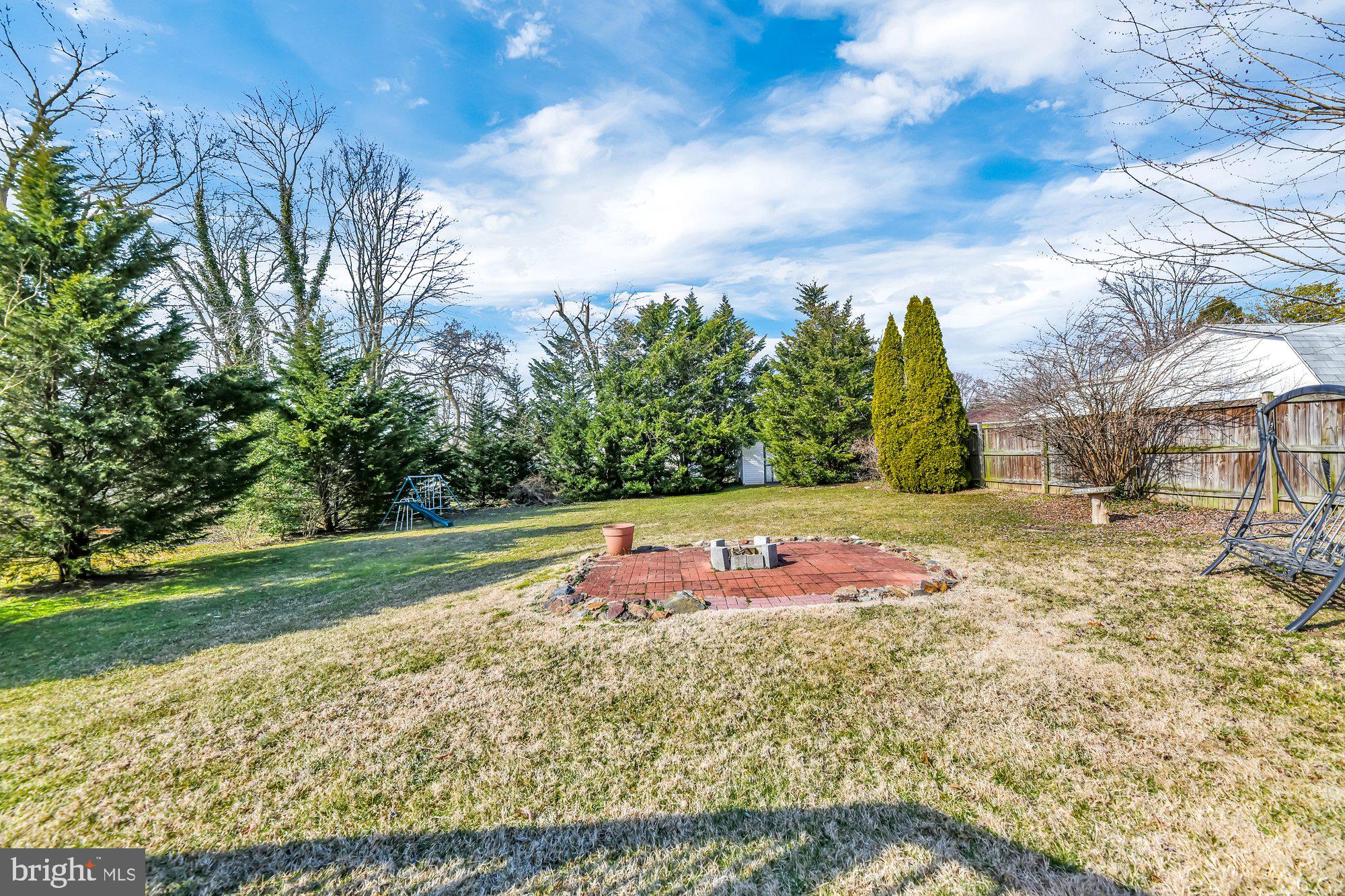 4559 Ridge Road Baltimore, MD 21236 - Photo 30 of 34 Paver patio with firepit