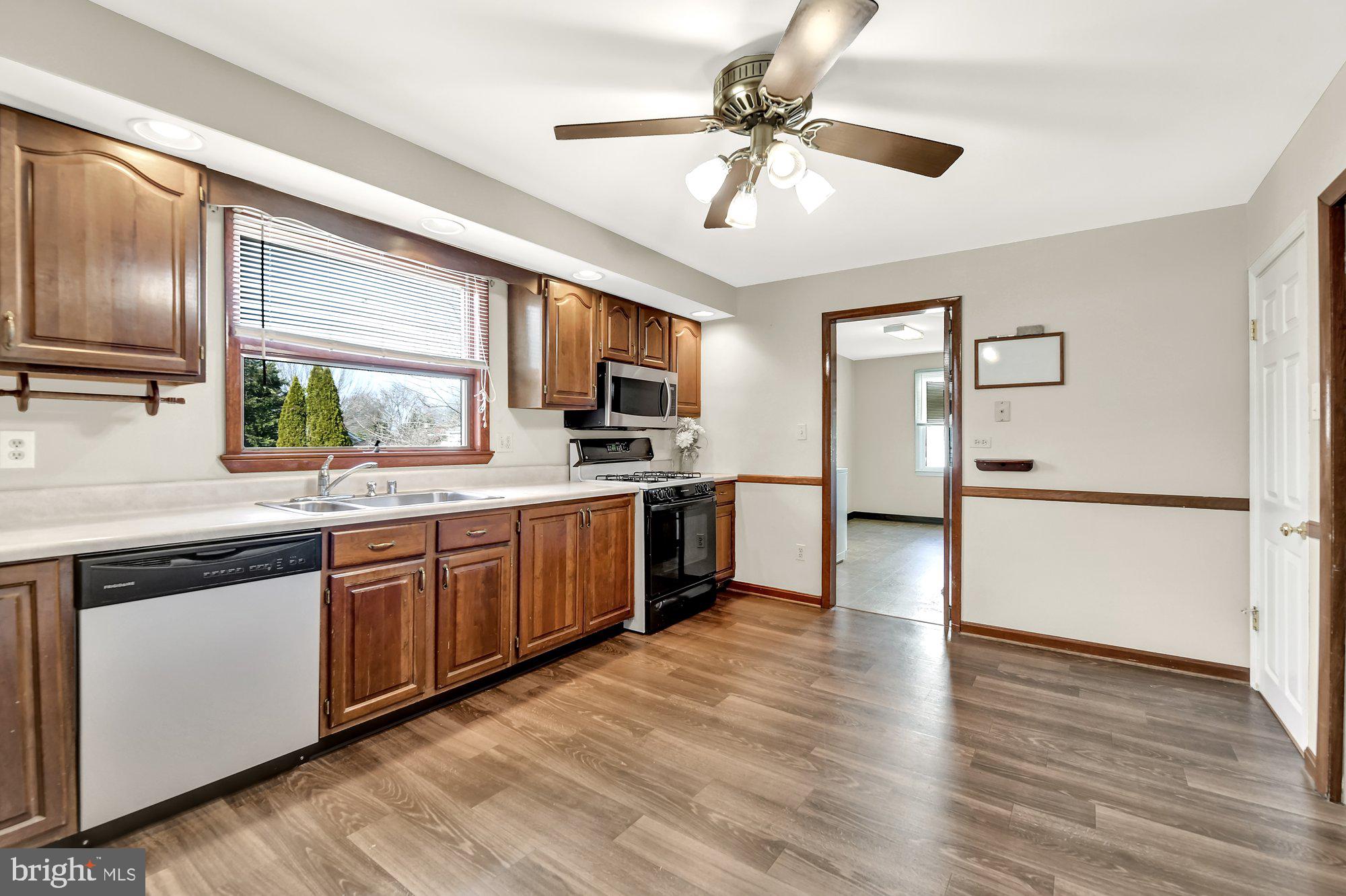 4559 Ridge Road Baltimore, MD 21236 - Photo 10 of 34 Wood look vinyl floor