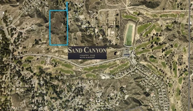 a sign that is sitting on a brick wall