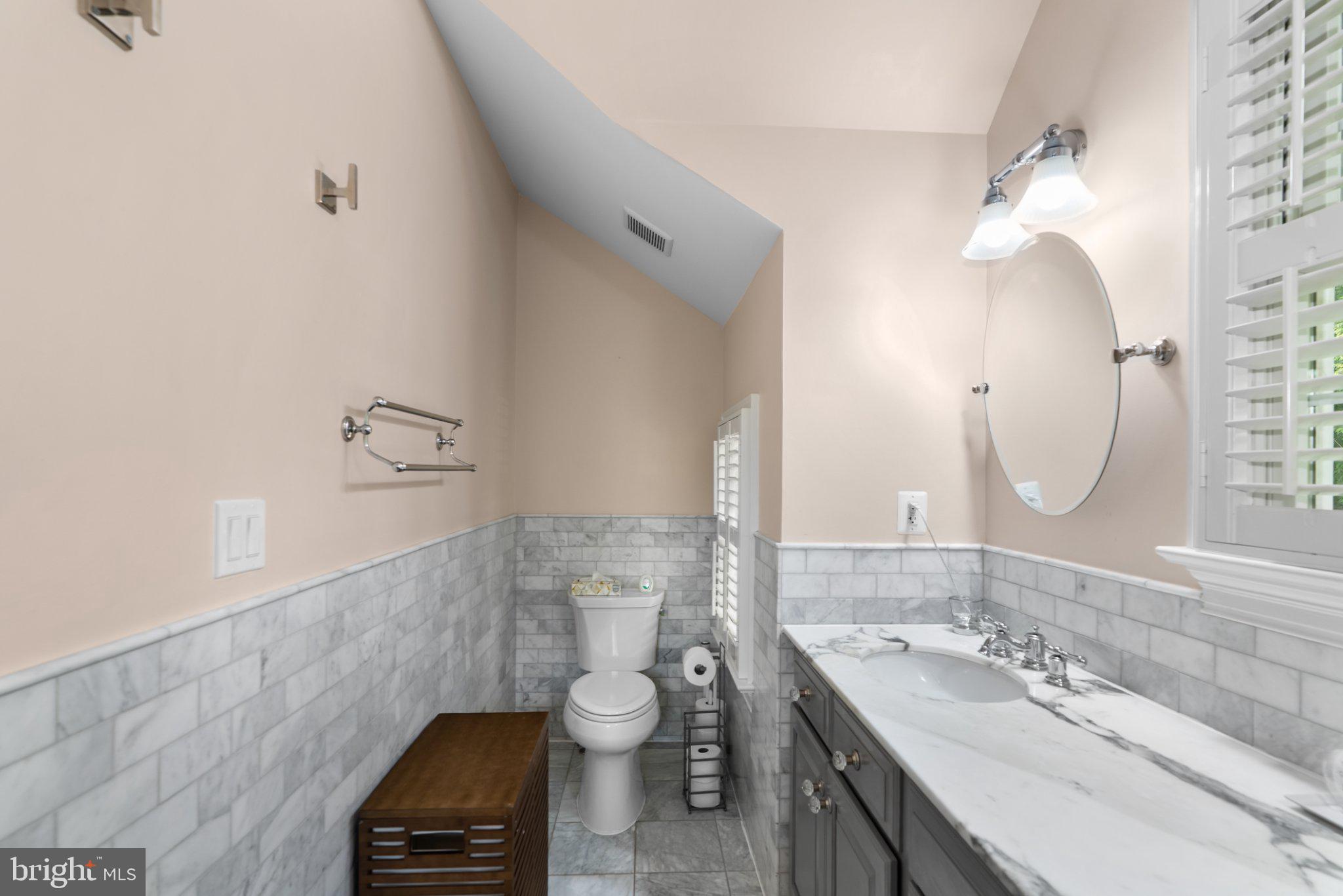 1000 West Braddock Road Alexandria, VA 22302 - Photo 23 of 55 Elegant marble bath with soft hues.
