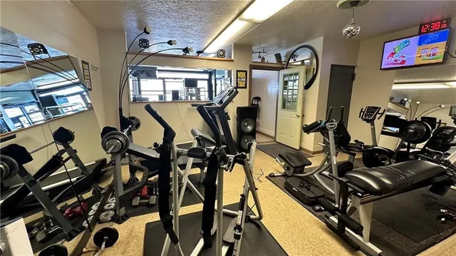 a view of a room with gym equipment