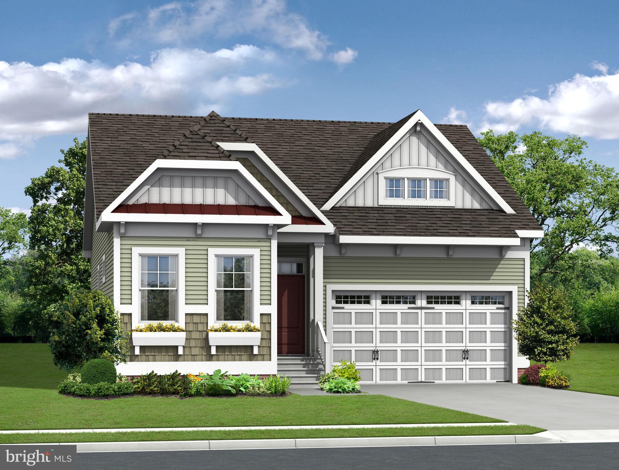 19503 Safflower Way Lewes, DE 19958 - Photo 4 of 4 a front view of a house with a yard