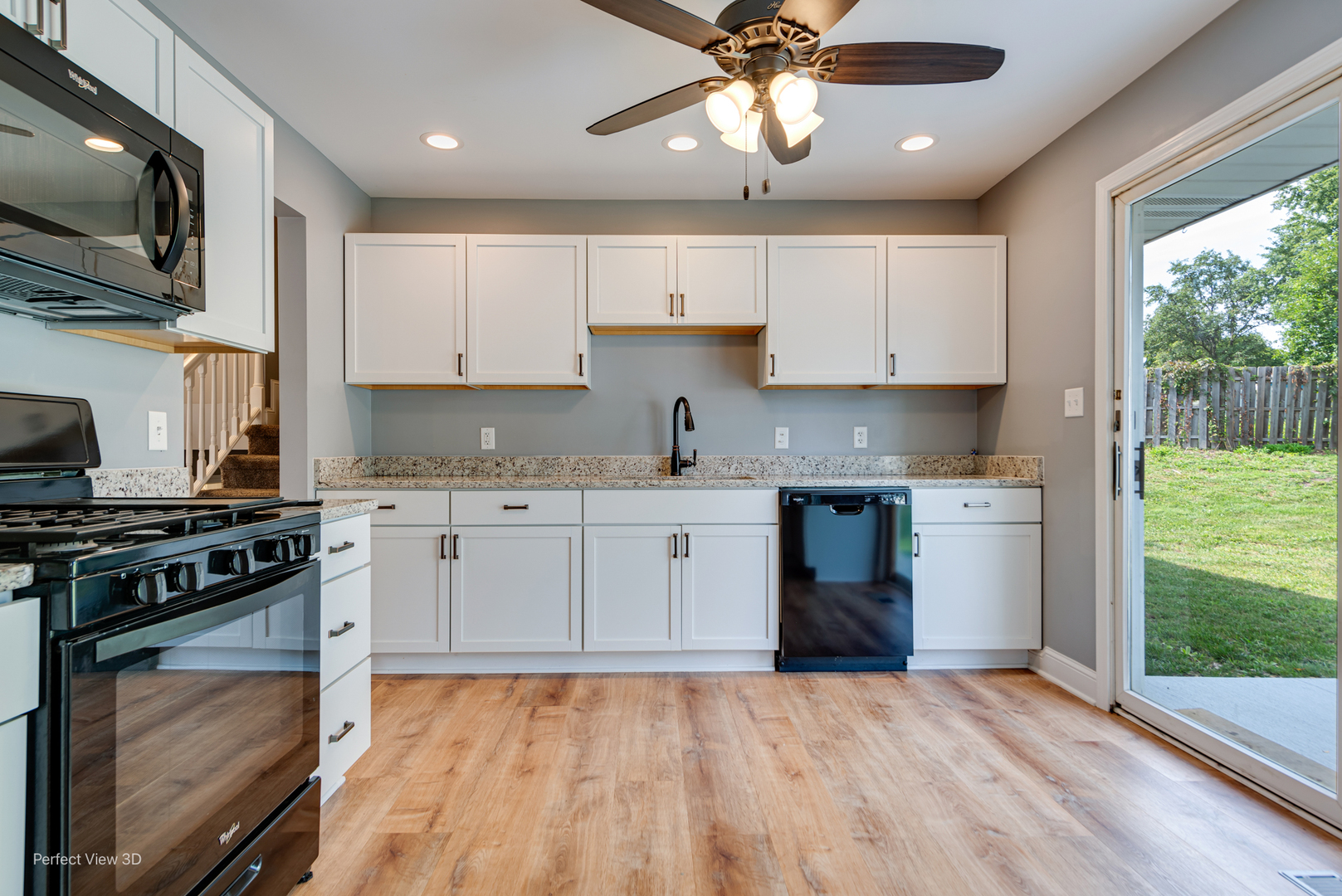 102 Hickory Lane Morris, IL 60450 - Photo 6 of 33 a kitchen with stainless steel appliances granite countertop a stove and a sink