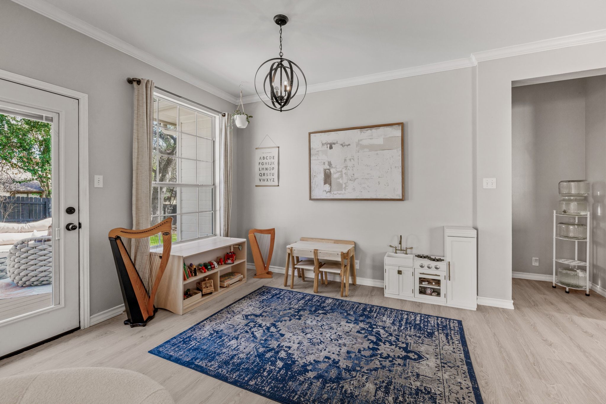 208 Sailors Run Lakeway, TX 78734 - Photo 12 of 40 A second dining area is located just off the kitchen with direct access to the expansive wood deck.