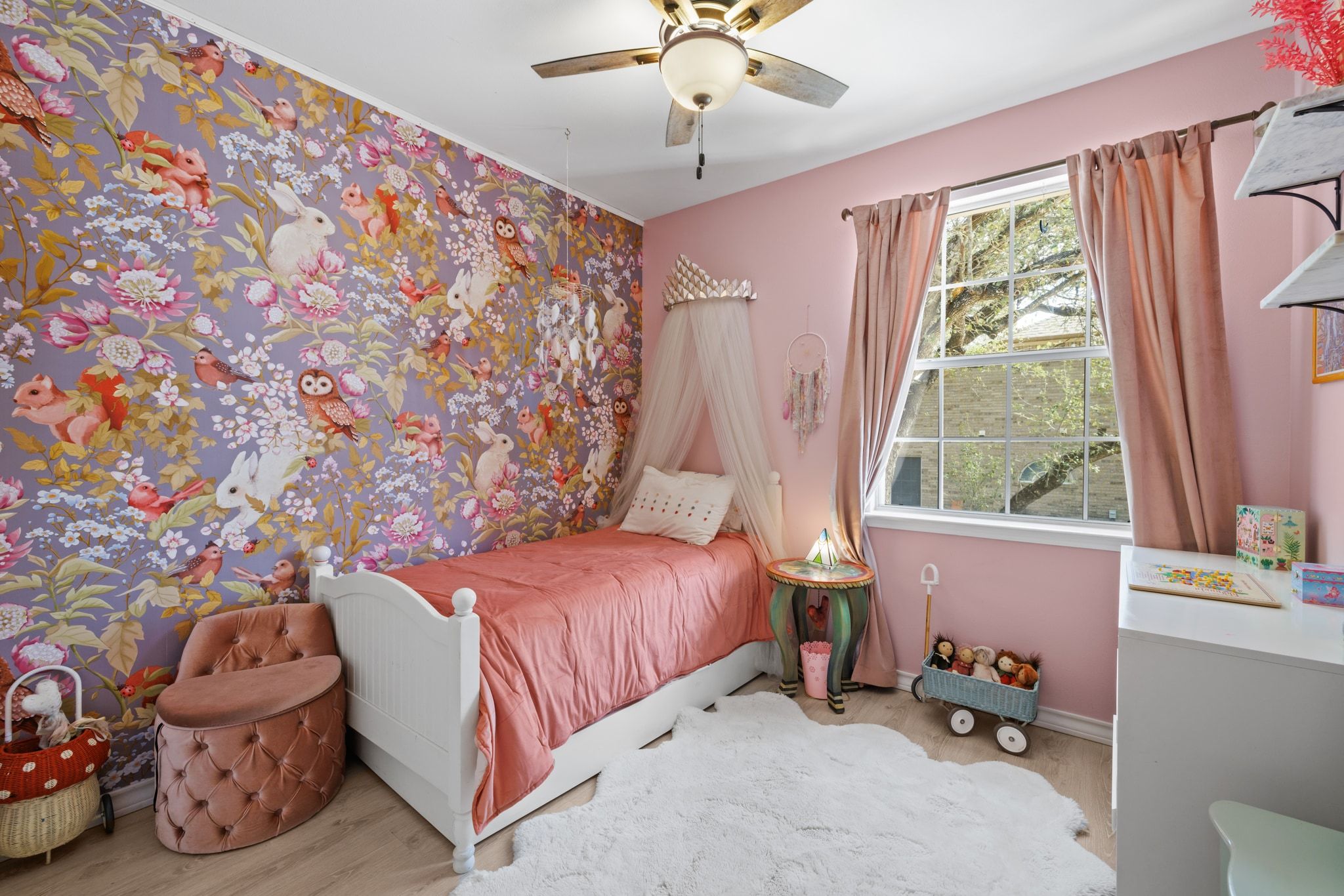 208 Sailors Run Lakeway, TX 78734 - Photo 18 of 40 The fourth bedroom boasts a gorgeous modern wallpaper feature wall.