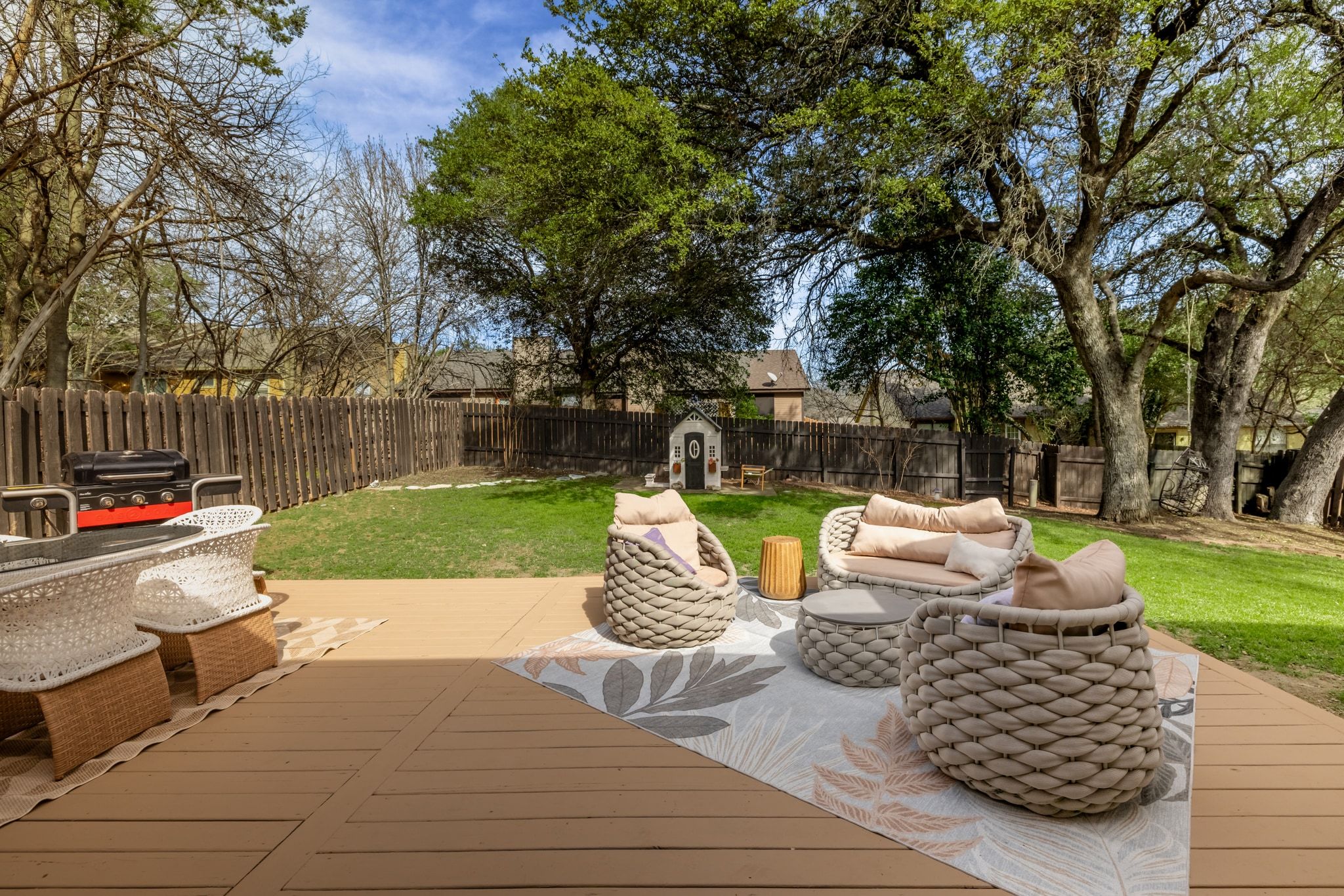 208 Sailors Run Lakeway, TX 78734 - Photo 21 of 40 The expansive wood deck offers the perfect space for outdoor dining, summer BBQs, and entertaining family and friends.