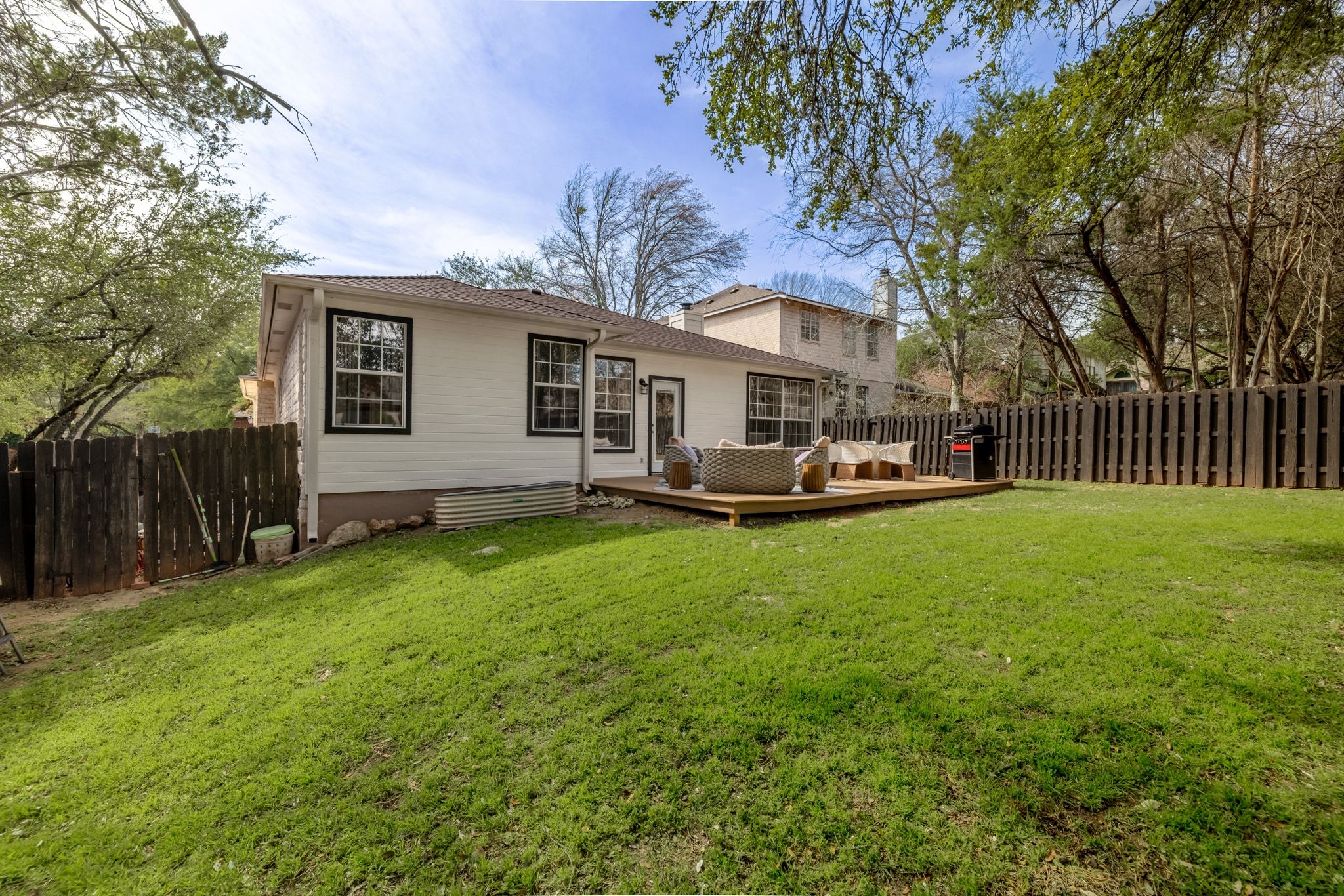 208 Sailors Run Lakeway, TX 78734 - Photo 24 of 40 With generous yard space and a fully fenced layout, there’s plenty of room to play, garden, or simply unwind outdoors.