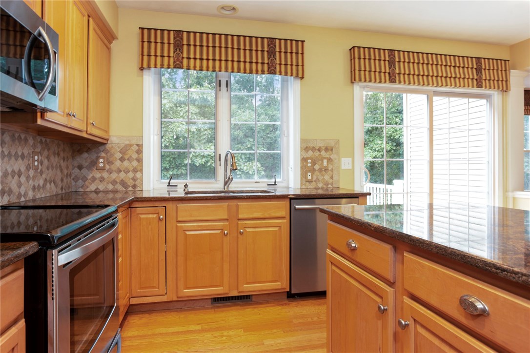 115 Castle Rocks Road Warwick, RI 02886 - Photo 9 of 24 View of private backyard and sliders to deck