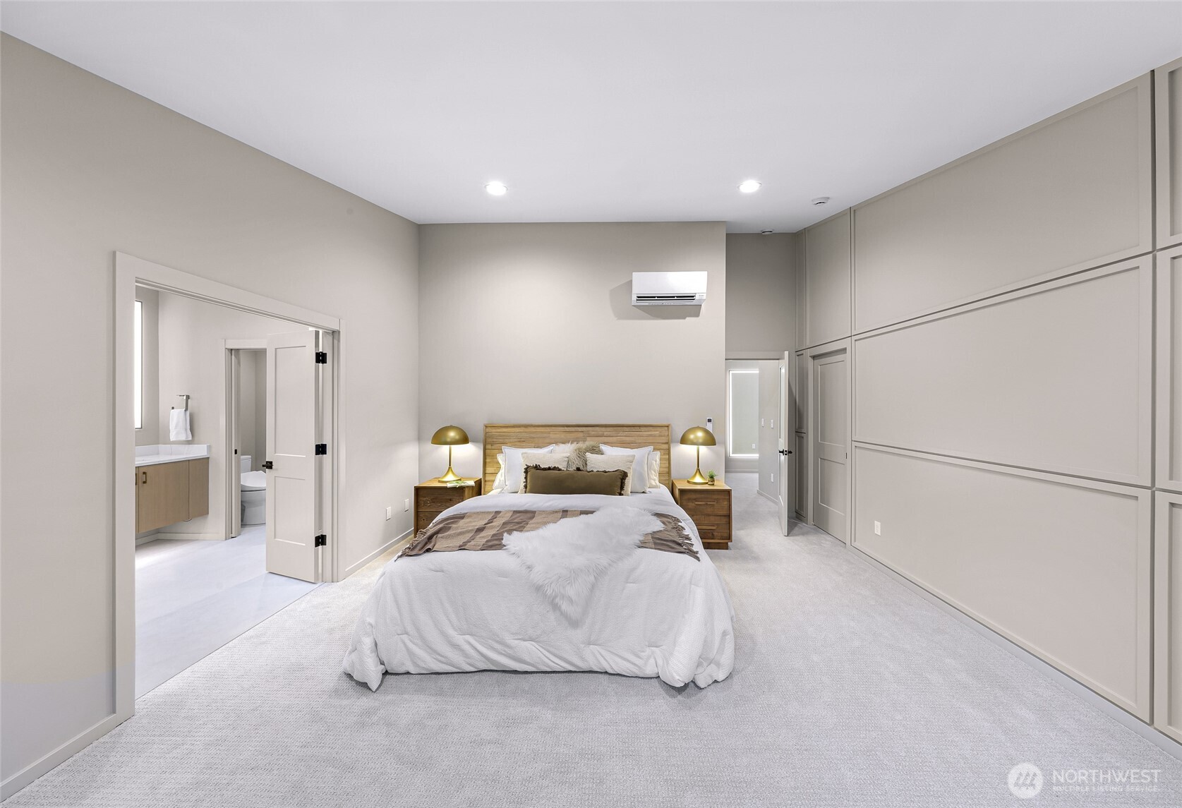 404 Willow Rd Place Bellingham, WA 98225 - Photo 14 of 40 a spacious bedroom with a bed and a refrigerator