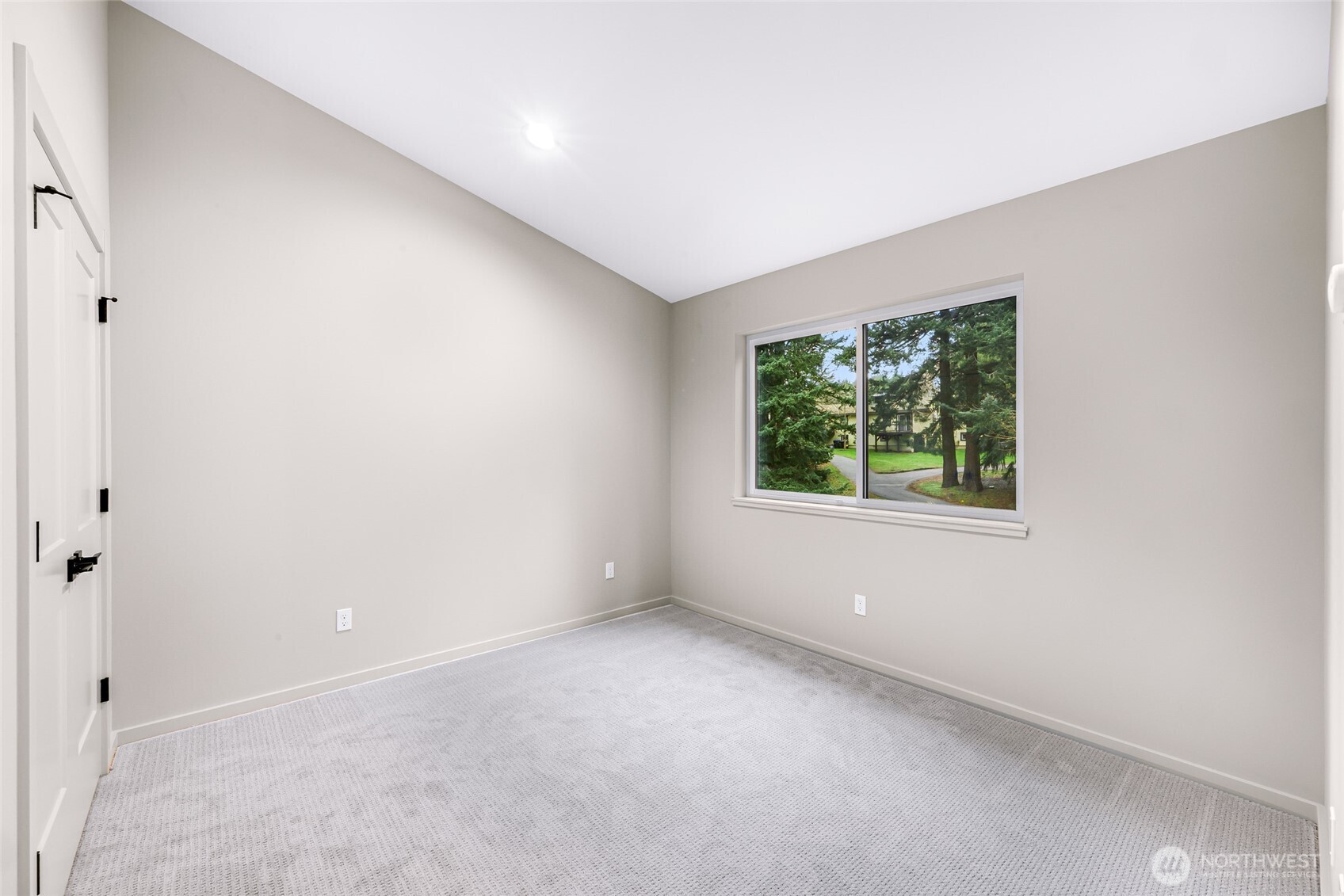 404 Willow Rd Place Bellingham, WA 98225 - Photo 21 of 40 an empty room with windows