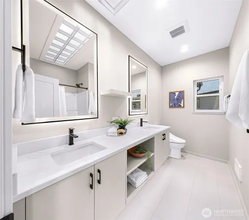 a kitchen with a sink cabinets and window