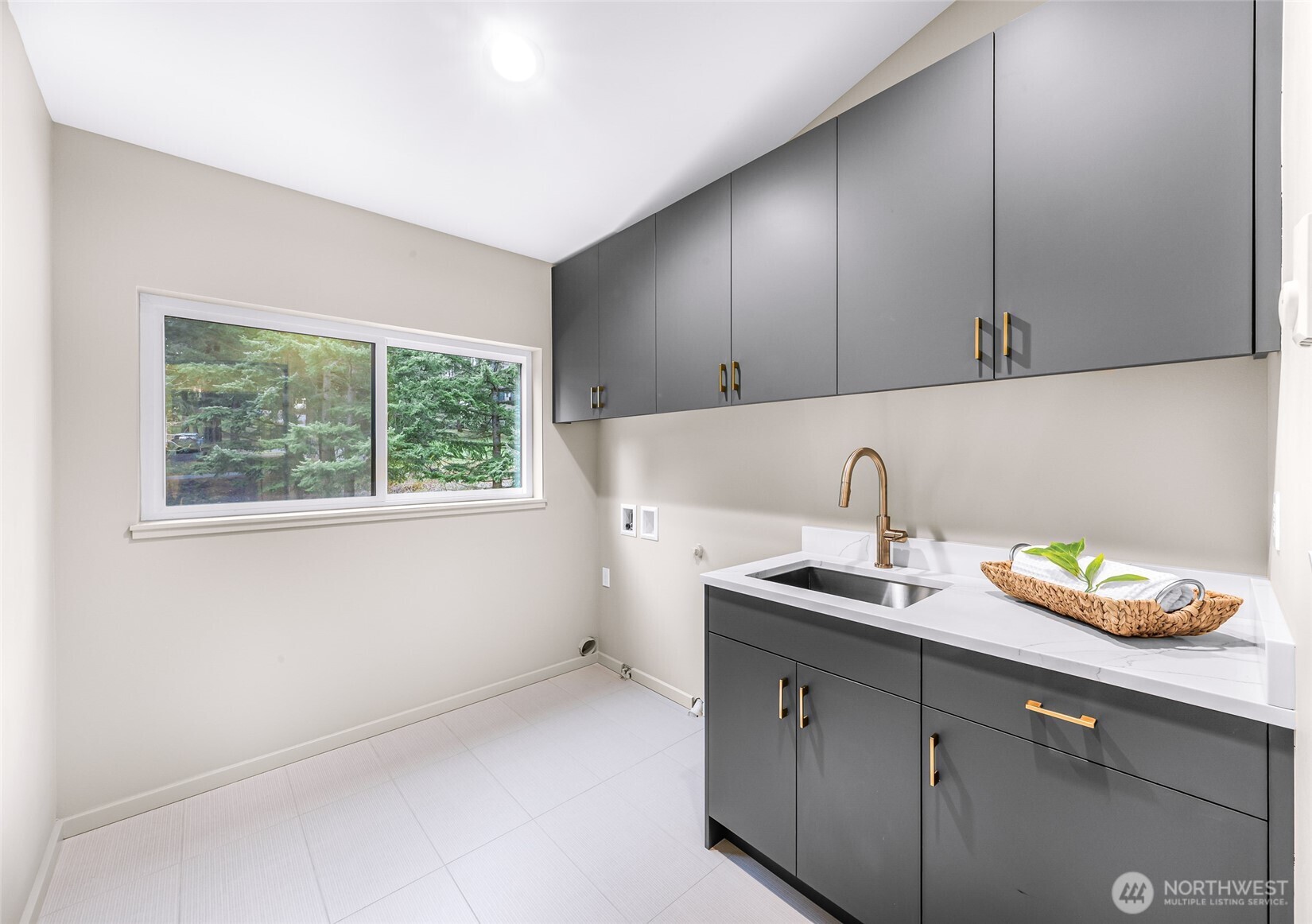 404 Willow Rd Place Bellingham, WA 98225 - Photo 27 of 40 a kitchen with a sink cabinets and window