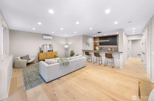 a living room with furniture window and a table
