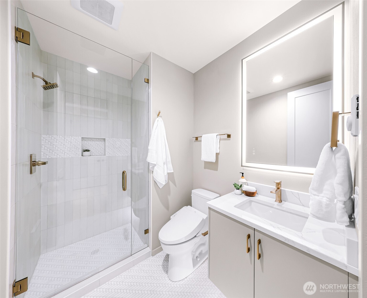 404 Willow Rd Place Bellingham, WA 98225 - Photo 36 of 40 a bathroom with a sink a toilet and shower