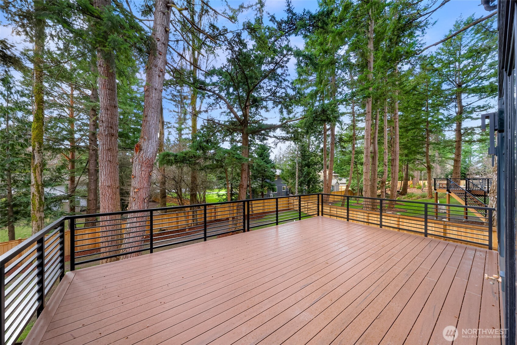 404 Willow Rd Place Bellingham, WA 98225 - Photo 40 of 40 a view of outdoor space with deck and tree