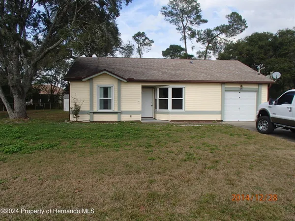 $1,725 | 13455 White Plains Street, Spring Hill, FL 34609