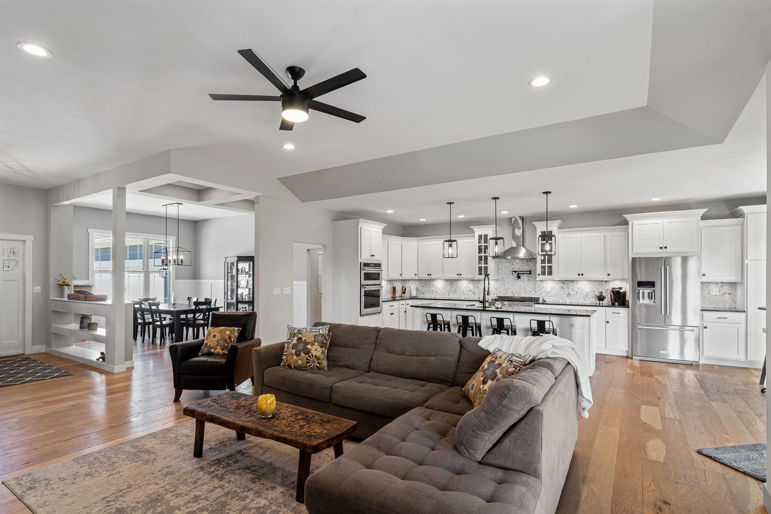 795 Madison Ridge Road Lawrenceburg, IN 47025 - Photo 6 of 68 Open plan with areas defined by ceiling accents