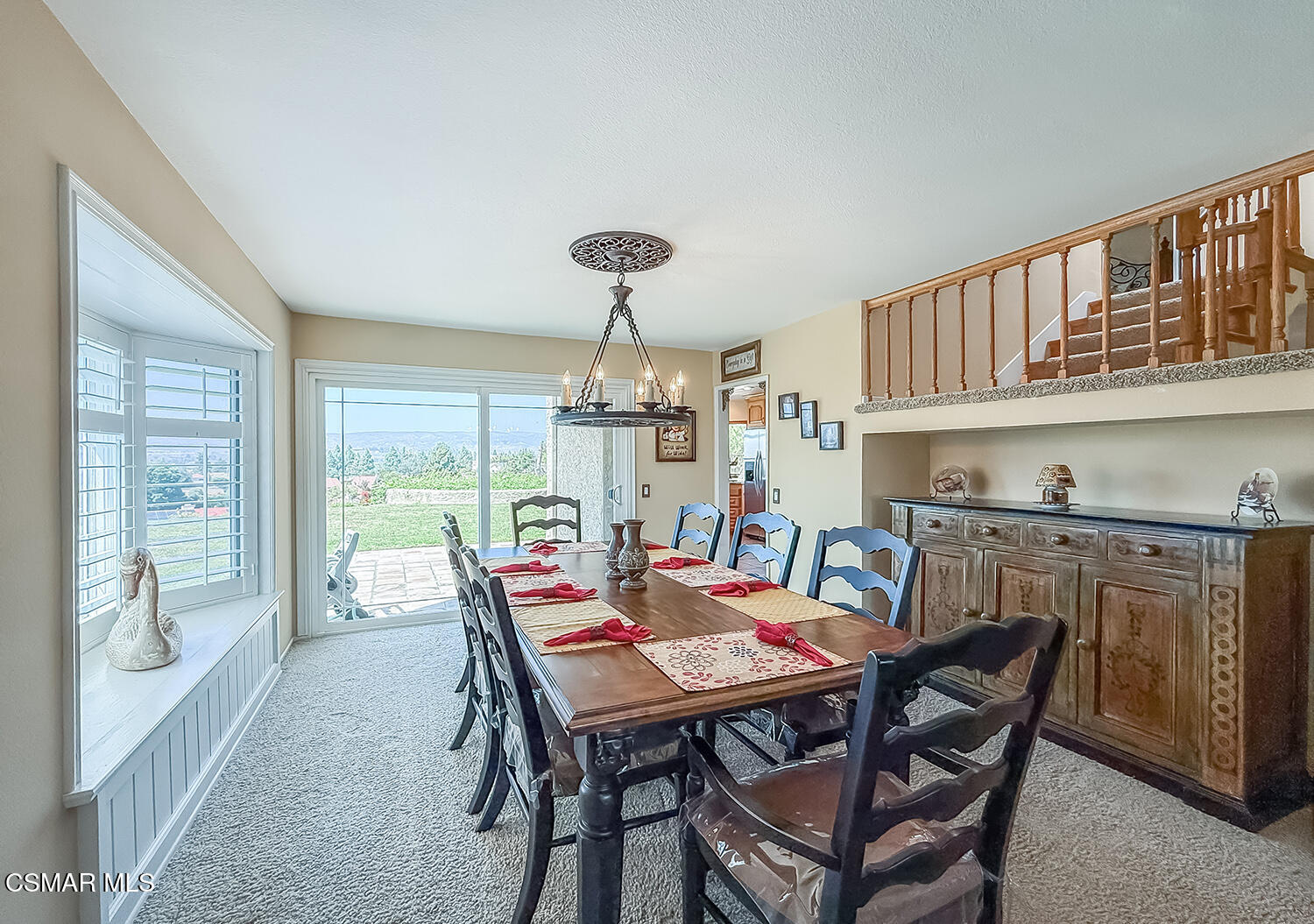 13749 Gunsmoke Road Moorpark, CA 93021 - Photo 15 of 61 a view of a dining room with furniture window and wooden floor