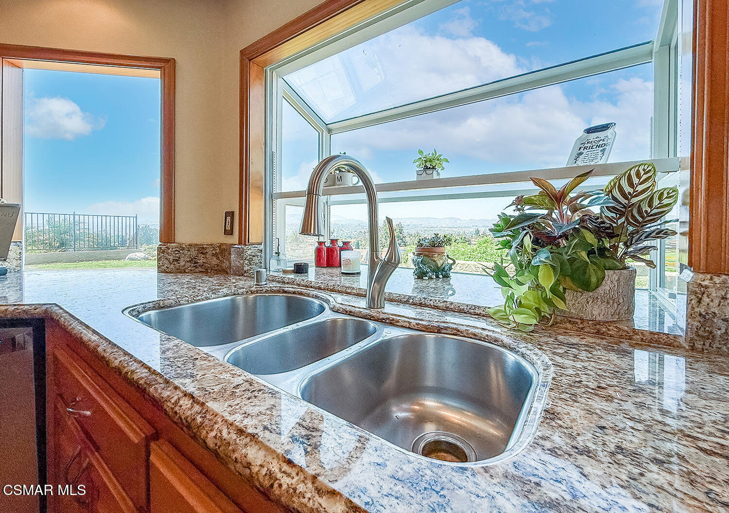 13749 Gunsmoke Road Moorpark, CA 93021 - Photo 27 of 61 a kitchen with a sink and a window