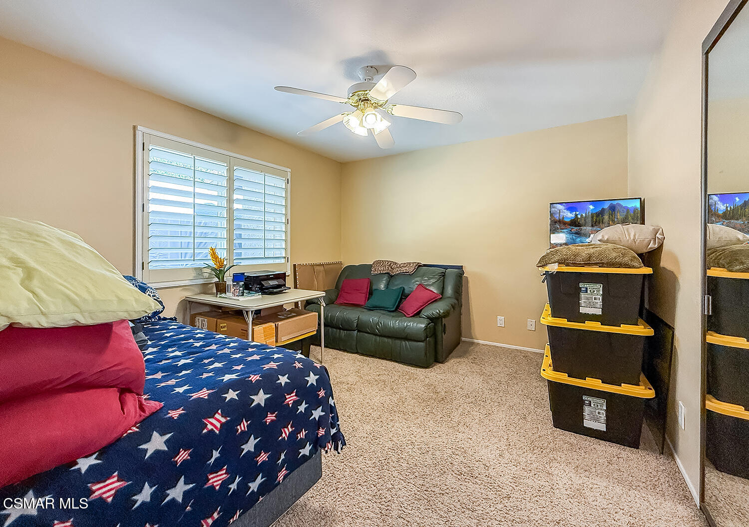 13749 Gunsmoke Road Moorpark, CA 93021 - Photo 29 of 61 a bedroom with a bed and a chandelier