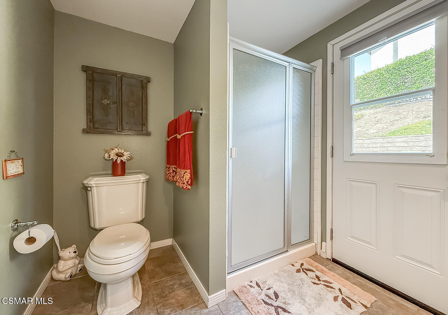 13749 Gunsmoke Road Moorpark, CA 93021 - Photo 32 of 61 a white toilet sitting next to a bathroom sink